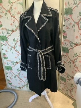Anne Carson  Black Silk Blend Trench Coat with White Contrast Trim.